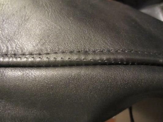 Holes in leather.