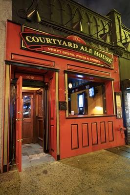 The entrance to Courtyard Ale House, the best craft beer bar in Queens, NY.