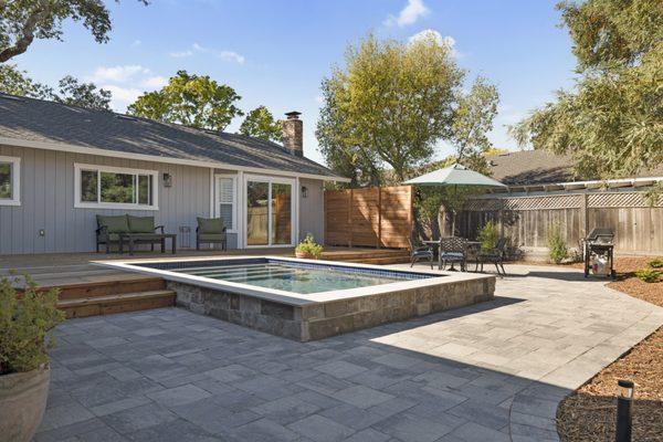 Bennett Valley backyard remodle with pavers, deck, mulch, lights and privacy fence.