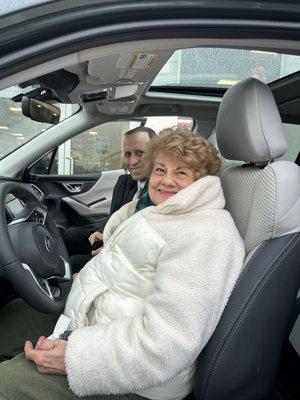 Mom enjoying her new Subaru with her favorite salesman Vinny Russo.