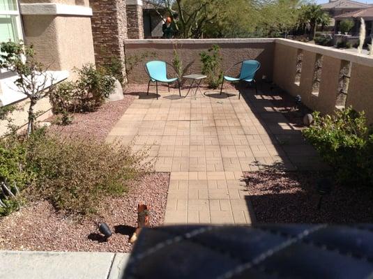 Front courtyard before. Not much motivation to enjoy a morning coffee in those chairs.