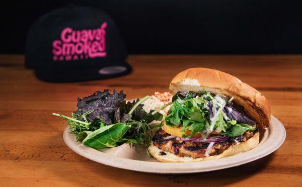 Guava Smoked Pork Burger on a Toasted Onion Bun, Red Onions, Tomato, and Kahumana Mixed Greens w/ our Creamy Vinaigrette Dressing...Must Try