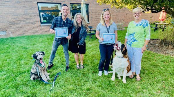 Novi Community Schools District School Therapy Dogs graduate from their training.