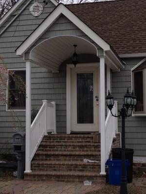 New Portico and Railings
 CertainTeed Resawn Shake Roof, Mitten Cypress Siding, White Trim in Lindenhurst NY