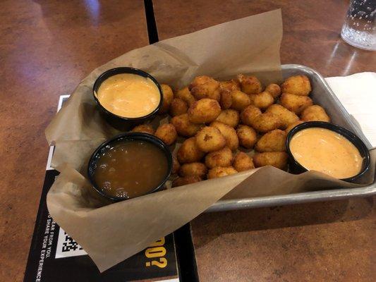 Cheese curds with a side of caramel. So good!