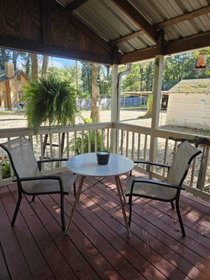 Comfortable front porch dining area