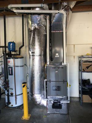 Oil to propane conversion and relocation. 96% efficient two stage 5 ton AC RUUD System.