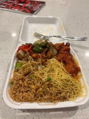 Half fried rice, half Singapore noodles, orange chicken and black pepper chicken.