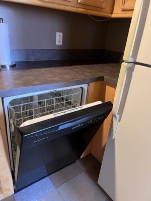 cannot open dishwasher without opening fridge door