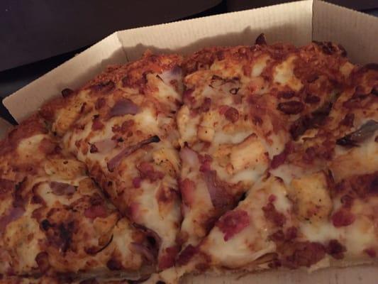 Chicken, bacon, and onion pizza with BBQ sauce and Parmesan crust. Great deal for $6