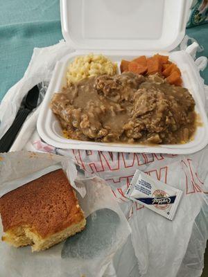 Smothered Pork chops, yams, macNcheese, corn bread