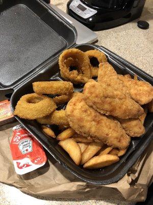 Chicken finger plate with fries and onion rings