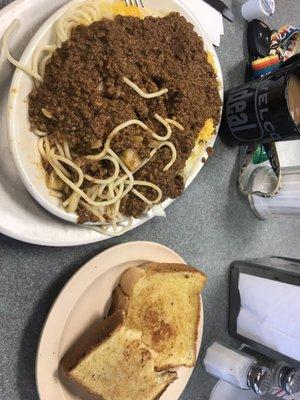 Regular Size Chili Mac w/ cheese. (Hot chili/hot dog sauce) garlic bread was separate. YUM-O