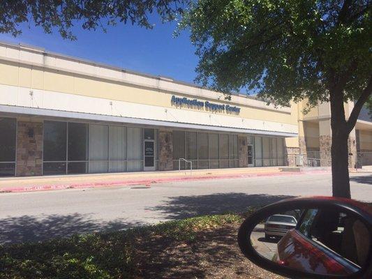 Exterior of the USCIS support center in Austin.  Located in a drab mall near a Home Depot. Nice staff.