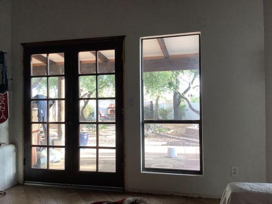 My old doors and odd window in the living room to be replaced.