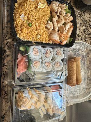 Chicken and shrimp hibachi, sushi and fried egg rolls