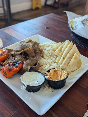 Gyro dinner that comes with rice or french fries and also a side salad like Greek