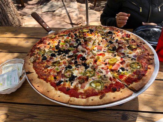 16" pizza w/ cheese, ham, black olives, mushrooms, bell peppers, onion & jalapeños. Crust tasted like cardboard, ruined pie.