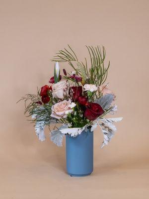 Fernseed bouquet in blue vase