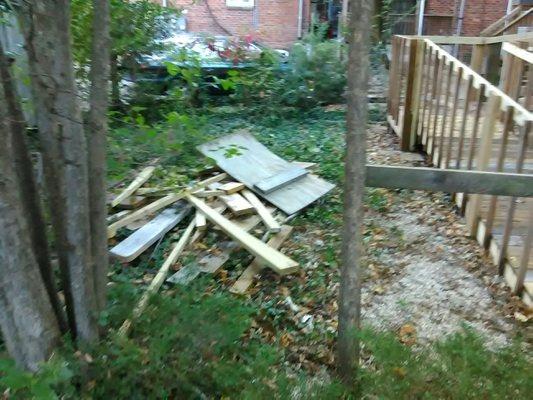 Pile of scrap lumber behind Old World Properties, 3106 Stuart Ave