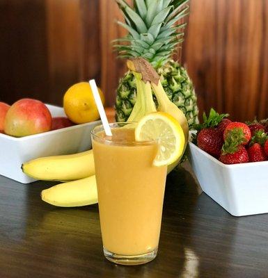 Tropical Twist Smoothie: Mango, Banana, Pineapple, Strawberry, Lemon Zest