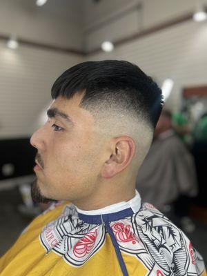 High bald fade with a French Crop