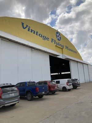 One of the two hangars with parking in front