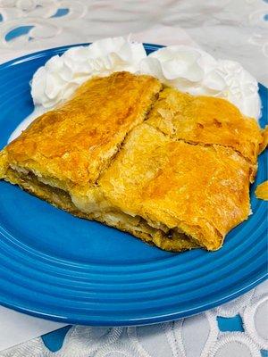 Apple strudel with whipped cream