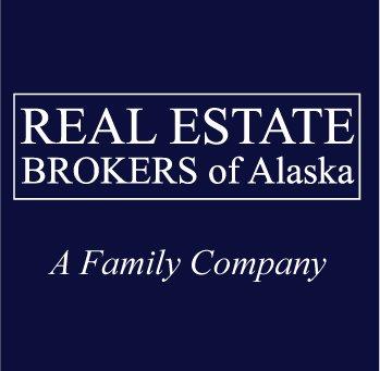 Real Estate Brokers of Alaska.  Company logo.  Helping buyers and sellers in the Anchorage real estate market.