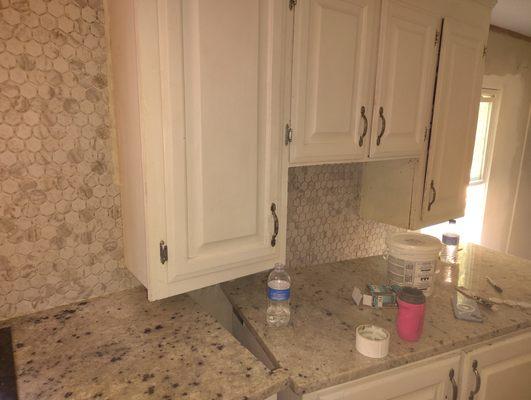 Granite countertops, cabinets and back splash