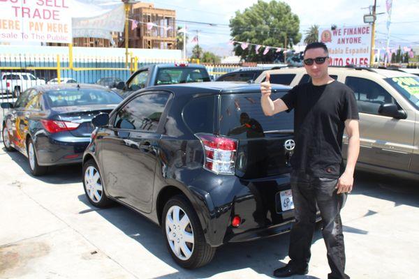 This man bought a Scion IQ, a car he wanted because it would be good on gas and easy to park in tight spots.