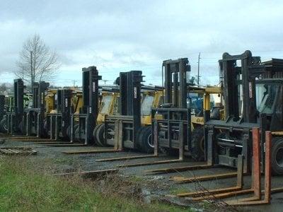 A fleet of forklifts at BMS Lift Truck Service in Fife