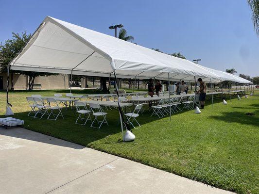 Three 20x40 canopies and tables/chairs for 240 people