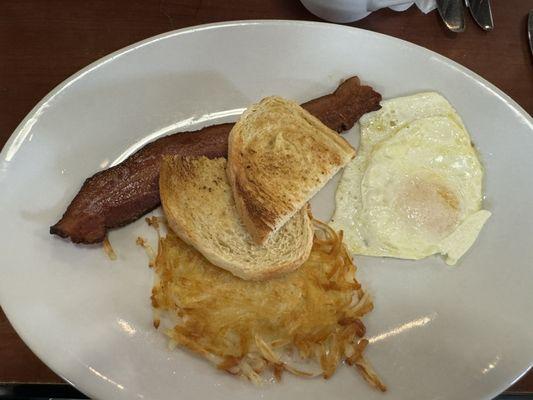 The Senior Special/ fried egg, bacon, hash browns and sourdough toast - under $10