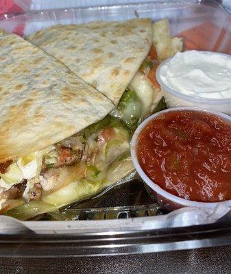 Delicious Gringo (Chicken) Quesadilla w/ sour cream and pico de gallo on side