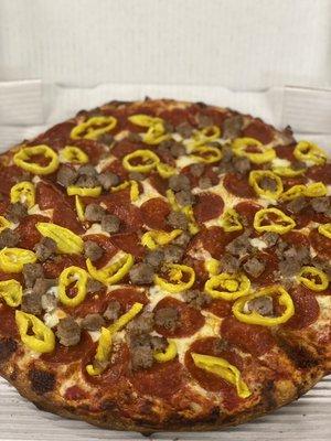 Pepperoni, banana peppers and homemade Italian sausage