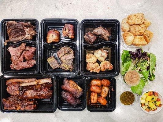 9 varieties of meats, 2 salads, and an order of cheese bread as pandemic takeout. IG: @take.a.bite.with.me