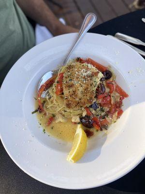 Parmesan panko crusted orange ruffy w mediterranean sauce over linguine