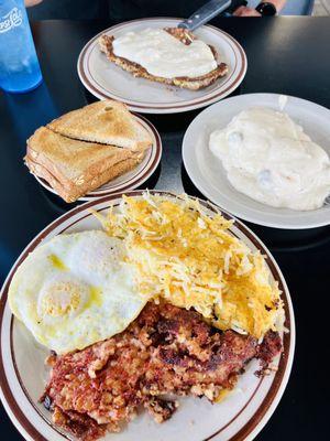 Corn beef, hash browns, eggs, toast, chicken fried steak and biscuits and gravy