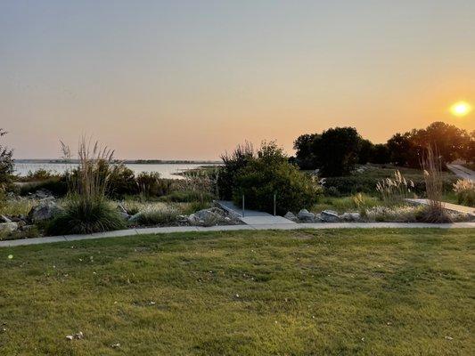 Just a few steps away from our camper; overlook to lake at sunset.