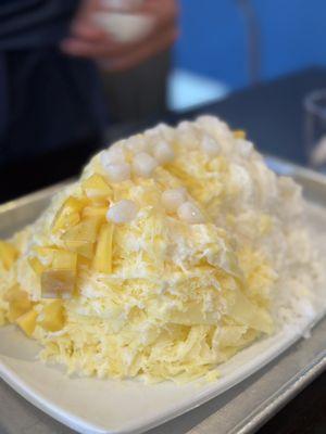 Plate order of mango and lychee.  Toppings mochi and mango and sweet condensed milk.