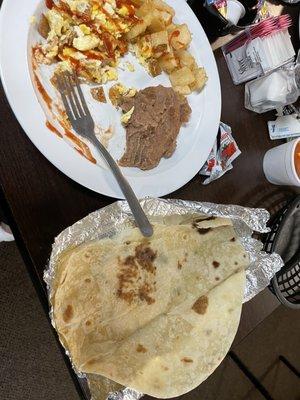 Migas plate with potato and beans