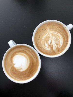 Two lattes (left with non fat, right with regular milk)