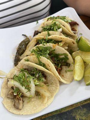 Tacos 2 barbacoa 2 tripa 1 pastor- they all were very good. Liked that you got to order the tripa just the way you want it.