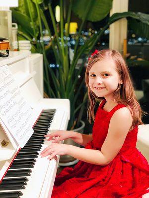 She enjoys our piano lesson