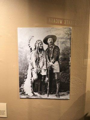 Sitting bowl left, Buffalo Bill right