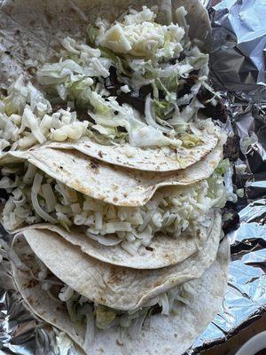 Fajita Steak Tacos with lettuce and cheese!