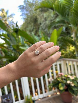 2.8 carat emerald cut lab diamond center stone with baguettes on the side. Set in yellow gold.