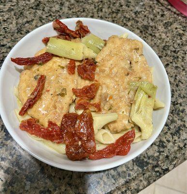 Chicken Francese Dinner Ordered it to go- added sun dried tomatoes and artichokes.