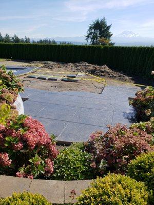 Roman Slate stamped and stained concrete with hand cut joints